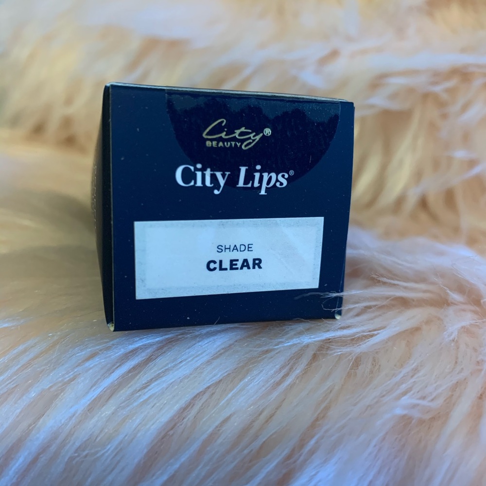 NIB City Lips. CLear lip plumping gloss